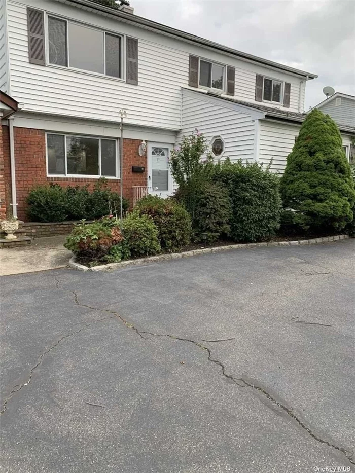 Legal 2 by CO. Second floor unit updated with three bedrooms, large living room, dining room, full bath (w/tub). All hardwood floors throughout, kitchen with stainless appliances. Shared washer and dryer. Close to all.