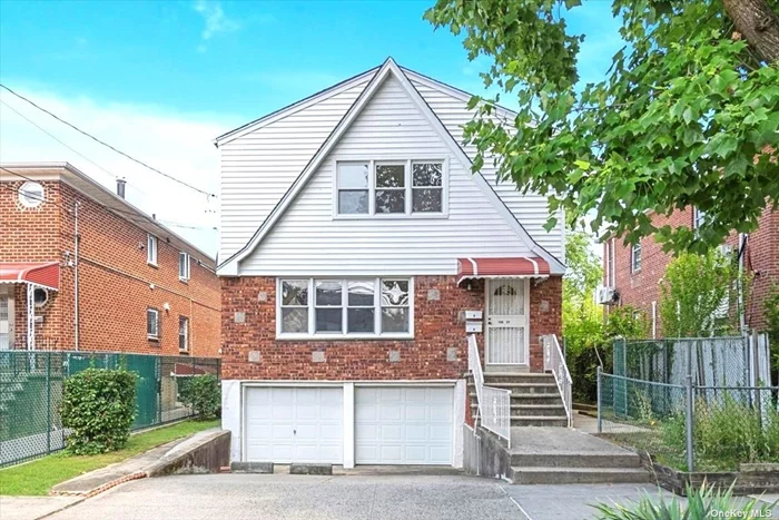 Amazing Detached Brick/Frame 2 Family 25.58x45 Building Size On Prime Quiet Block In Flushing Location- New Kitchen, New Baths. Excellent Condition 6 Rooms Over 6 Rooms With 3 Baths + Full Finished Basement W/ Separate Entrance, Ample Yard & 2 Car Garage, Walking distant to supermarket, shops, restaurants, park. Sunny South Facing House With Terrific Curb Appeal Great Flow Of Entertaining. Exceptional Opportunity ! **Whole House Can Be Deliver Vacant **