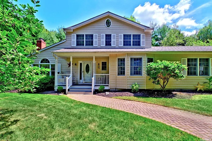 Welcome To The Village at Wading River. Spacious 4 Bedroom 3 & 1/2 Bath Farm Ranch, w/ Over 2600 Square Feet, Perfect For Large Gatherings, Living Room w/ Wood Fireplace, Formal Dining Room, Beautiful Great Room Leading To Sunroom w/ Walls of Glass & Gas Fireplace. Hardwood Floors, Beautiful Front Porch. Located in Shoreham-Wading River School District. Very Close To Wading River Beach. Driveway Can Accommodate 7 cars. Very Private Back Yard w/ Flowering Trees.