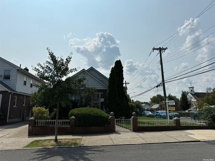 Beautiful One Story Cape Cod Brick House on a Corner Lot for Sale in Bayside. Features in First Floor: Living Room, Dining Room, Eat in Kitchen, 2 Bedrooms, 1 Full Bathroom & 1 Half Bathroom. Finished basement and separate entry. 1 Car Garage & Private Driveway. Close to Shops and Transportation.