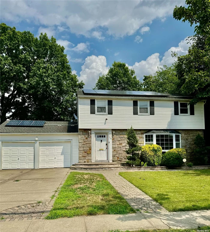 Welcome, to this great and spacious colonial. This well maintained colonial features an updated eat in kitchen, 4 large bedrooms, wood floors, wood burning fireplace, 3.5 bathrooms and a spacious finished basement. The 2.5 car garage and a 4 car driveway make this the perfect place to call home. Close to all and walking distance to Hofstra University. It&rsquo;s close proximity to Hofstra make it a great location may appeal to college students. Solar panels are not completely paid for