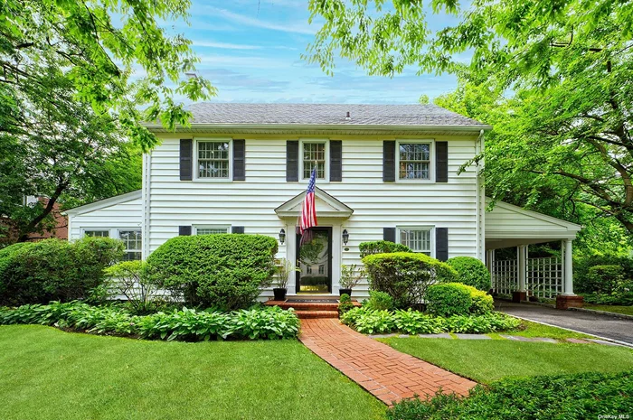 Discover timeless charm and modern comfort in this exquisite 4-bedroom, 2.5-bath center hall colonial located in sought-after Great Neck Estates. This meticulously maintained home blends classic elegance with contemporary updates, offering the perfect backdrop for your next chapter. The inviting living room features elegant dentil moldings and a wood-burning fireplace. Adjacent is a serene sunroom with a tin ceiling and abundant natural light. The formal dining room is ideal for large gatherings. The gourmet eat-in kitchen boasts brand-new stainless steel appliances, custom cabinetry and a delightful breakfast nook that will impress even the most discerning chefs. The first floor also includes a versatile bedroom/office, a pantry, and a powder room. Upstairs, find three generously-sized bedrooms and two full baths, including a primary en-suite with a full bath and access to a private balcony. Additional third-floor space offers endless possibilities for customization. The lower level features a spacious recreation area, ample storage, a laundry room, and outside access. Situated on an oversized, flat, fenced lot, this home provides plenty of outdoor space for play and relaxation. Conveniently located near town, train, and shops, with the choice of Great Neck North or South Middle and High Schools. Access to Great Neck Estates Park, which includes multiple pools, tennis and basketball courts, and waterfront views. Don&rsquo;t miss your chance to own this exceptional property in a prime location.