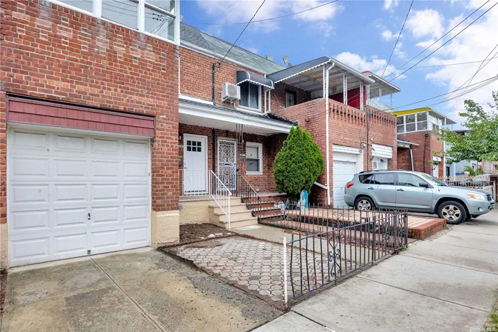 STUNNING FULLY RENOVATED ATTACHED BRICK HOME IN JAMAICA PRIVATE DRIVEWAY W/ATTACHED GARAGE 2ND FLOOR VERANDA OPEN VIEW FIRST FLOOR WALK OUT SLIDING DOOR TO THE REAR 3 SPECIOUS BEDROOMS 2.5 BATHS FINISHED BASEMENT WITH 3 SEPERATE ENTRANCE CLOSE TO BUSES, TRAIN AND ALL AMENITIES AROUND JAMAICA AVE.