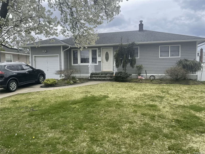 Welcome to your new home! This 3 bed 1 bath with large full basement partially finished is centrally located right off Sunrise Hwy at the end of a quiet block. Close to restaurants, shops, and stores on Sunrise and Wellwood. Move in ready!