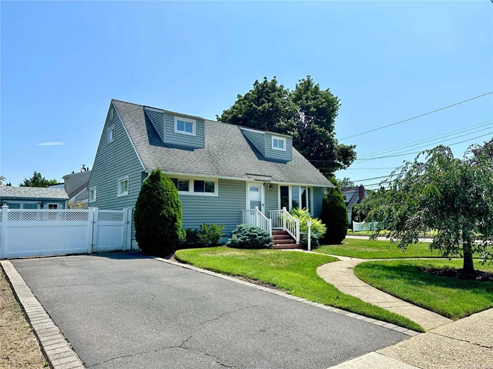 Welcome to this charming cape-style home, ideally situated on a spacious corner lot! This residence features 4 generously sized bedrooms and an inviting open-concept living space. Highlights include a newly remodeled kitchen, new hardwood floors, updated lighting, and a fully renovated first-floor bathroom. The finished basement provides additional space, complete with a full bathroom and a separate laundry area. The fully fenced yard includes in-ground sprinklers, a deck and two large sheds which the seller will leave as bonuses for the fortunate buyer!