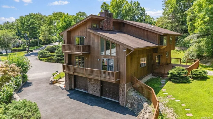 Spacious and bright this 4-bedroom, 3.5-bathroom haven, perfectly perched on a hill in a serene cul-de-sac. This exceptional residence features a massive-sized kitchen adorned with a huge center island and top-of-the-line stainless steel appliances, seamlessly leading to a backyard patio. The home boasts a stunning brick double-sided wood-burning fireplace, providing warmth and elegance to both the expansive living room and the adjoining dining area. Flooded with natural light from the double-high windows, the high ceilings amplify the sense of space and grandeur throughout. The spacious primary bedroom is a true retreat, complete with an ensuite bathroom and a private balcony, offering a perfect place for relaxation. The living room, featuring sliding doors, opens to an inviting outdoor deck, ideal for entertaining or enjoying tranquil moments. Convenience is key with a laundry room on the main level and a full finished basement, providing ample space for recreation or storage. The two-car garage ensures ample parking and additional storage. This home is a blend of luxury and comfort, making it the perfect sanctuary for those who appreciate the finer things in life. Don&rsquo;t miss the opportunity to make this exquisite property your own!