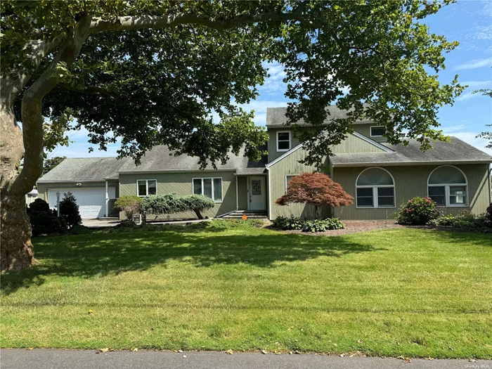 Lovely Magoun landing Farm ranch Home. Unobstructed Bayviews, 150 ft bulk head on wide deep canal.Ready to be updated.Beautiful Landscaped property.