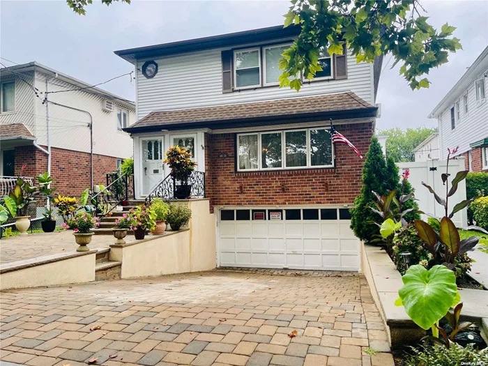 Beautiful 2 Family House. Fully Renovated In 2016. Lot Size 40X100, 3Br 1.5Bath On Each Floor, Custom Designed Modern Kitchen and Bathroom. Finished Bsmt With Family Room, Utility Room, Laundry Room,  Separate Entrance To Back Yard. 2 Attached Garages. Close To Shopping Center, Supermarket, Public Transportation And Schools.