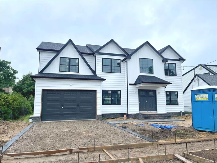 Now showing this stunning 3250 square ft. new construction in the heart of the village. Ready for occupancy mid September! Top-of-the-line finishes include 9 ft. ceilings on first level, custom gas fireplace with built-in shelving, designer kitchen with hi-end stainless appliances/double wall oven/granite counters, 2nd floor laundry room, full basement w/ 8 ft. ceiling and outside entrance, primary suite w/huge walk-in closet and 4 additional bedrooms, gorgeous custom trim work and moldings througout, 2 car garage, and attic storage. Another top quality home by established builder with 35+ years experience and 400 new homes to credit. Your dream home is waiting. Virtually staged for visual enhancement. Buyer responsible for water meter/tap fee, final title survey, and NYS transfer tax.