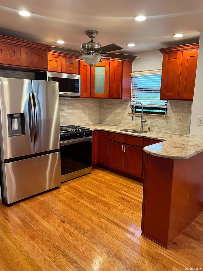 Renovated 3 bed 1 bath Hardwood Floors Stainless Steel Appliances Large Living Room Garden View Hardwood Floors Close to Belt Parkway and LIRR