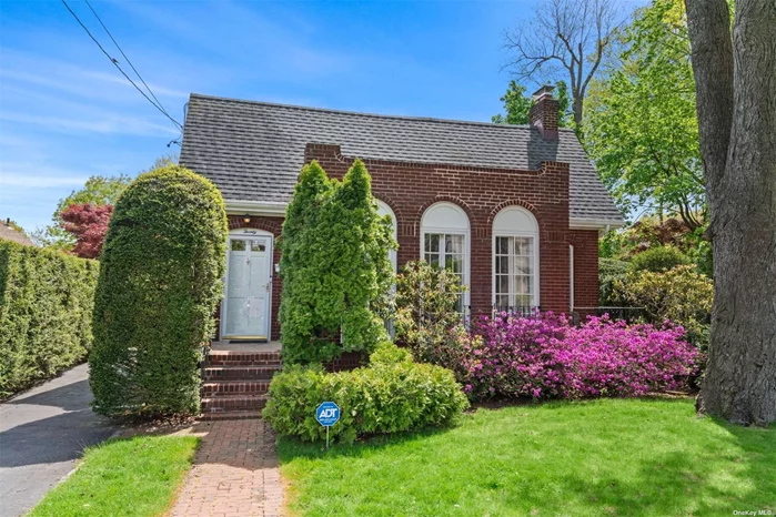 Welcome to a charming slice of history nestled on one of the most enchanting streets in Huntington Village. Built in 1923, this timeless ranch-style home exudes character and elegance, offering a glimpse into the past while embracing modern comforts. As you step through the front door, you&rsquo;re greeted by a lovely foyer that sets the tone for the inviting warmth that permeates every corner of this residence. Enter the large and elegant living room, where walls of true French doors flood the space with natural light, inviting the outdoors in and creating a seamless connection to the surrounding beauty. Nestled within, a wood-burning fireplace stands as the heart of the home, offering a cozy retreat on chilly evenings. The wood floors, adorned with inlay trim, add a touch of sophistication and charm as well as 9&rsquo; ceilings accentuating the timeless allure of the space. The formal dining room, bathed in daylight, offers a perfect setting for intimate gatherings or lively dinner parties. With a lovely flow to the large updated eat-in kitchen, complete with maple cabinets and stainless appliances, this area becomes the heart of the home where culinary delights are savored and shared. Step outside onto the deck for alfresco dining, surrounded by the tranquil beauty of the outdoors. Two spacious bedrooms offer comfort and serenity, while an updated full bath completes the well-thought-out floor plan. Additional space awaits in the walk-out basement with an attached garage, providing ample storage and potential for further expansion. Meanwhile, the walk-up attic area offers even more possibilities, limited only by your imagination. Outside, the property is adorned with beautiful mature plantings, creating a picturesque backdrop for outdoor relaxation and enjoyment. With a low-maintenance yard, you can spend more time appreciating the beauty of your surroundings and less time on upkeep. Located just a stone&rsquo;s throw from the heart of the village, this home offers easy access to dining, entertainment, and all the vibrant offerings of Huntington Village. Whether you&rsquo;re strolling to your favorite restaurant or exploring the local shops and galleries, this village beauty offers the perfect blend of historic charm and modern convenience. Welcome home to this timeless treasure in the heart of Huntington Village.