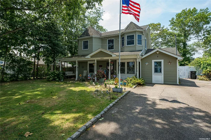 Home is where the hearth is! This country colonial boasts a dual wood burning fireplace that is shared by the dining area and bonus sunroom. The kitchen features soaring ceilings, oak cabinets, island and gas cooking. Second floor balcony overlooks deep property complete with koi pond, greenhouse, entertainment area wih brick pizza oven and pool. Enjoy a lifestyle of outdoor relaxation, activities and gatherings.