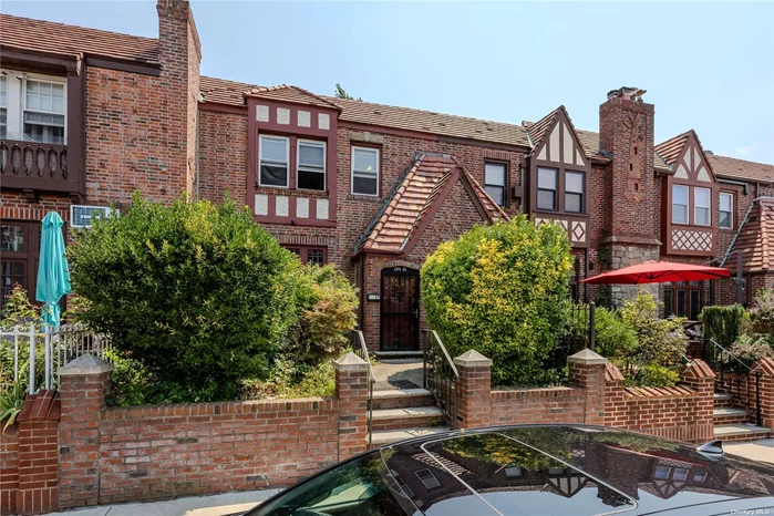 Introducing this beautiful home on 229th St., it is a charming attached brick English Tudor nestled in the historic town of Laurelton. This home boasts a sunken living room with original hardwood floors throughout, a beautifully designed brick wood-burning fireplace, mosaic glass windows, high ceilings, and ornamental millwork, showcasing its timeless appeal. The eat-in kitchen features granite counters, stainless steel appliances, and a cozy dining nook-perfect for your morning breakfast! A door leads to an outside patio and yard. Upstairs, you&rsquo;ll find a spacious primary en-suite with his-and-hers closets and a full bath with an accent tile backsplash, a jacuzzi tub, and an additional shower for ultimate relaxation. Two more bedrooms are located on this floor, along with a landing featuring skylights that bring in a burst of natural light. The full basement adds extra functionality, with cellar doors leading to the backyard. The backyard also includes a brick shed for storage and a patio, ideal for entertaining guests.