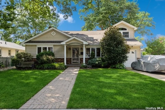 Discover the perfect blend of style and functionality in this front to back split level. Amenities include beautiful EIK with granite counters, sub-zero refrigerator, S/S appliances, self closing wood cabinets, Tray ceiling in Kitchen & Dining room. Vaulted ceiling in living room& Led Hi Hats as well as hardwood floors throughout. Primary bedroom with en-suite new ceramic tiled bath & WIC. 2 additional bedrooms with double closets. Huge den w/ new carpeting, bedroom, & 1/2 on Den level. Other updates include new roof, updated gas heating system w/separate HWH, updated electric with back up generator. Enjoy all this and as well as having a fully fenced private yard with exterior cameras, patios, 7 zone sprinkler system, alarm system and more.