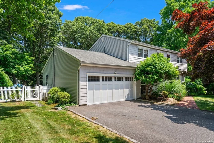 This Center Hall Colonial is the epitome of charm and convenience. Just a short stroll from the beach, this home offers 4 bedrooms and 2 1/2 baths, all highlighted by beautiful hardwood floors. The eat-in kitchen features French doors that open to a private patio, perfect for al fresco dining. The family room, complete with a stone fireplace with detailed mantel, surround sound speakers, and custom built-in bookcases, is an inviting space for gatherings. The living room offers French pocket doors leading to a private study, ideal for working from home. The spacious primary suite includes a large walk-in closet and an ensuite bathroom, providing a luxurious retreat. With three additional well-sized bedrooms, there&rsquo;s plenty of space for family and guests. The home also includes a 2-car garage with ample storage, and the outdoor brick patio off the kitchen, complete with outdoor speakers, is perfect for entertaining. Updates include new cesspool - 2022 and updated electric - 2020. The basement recreation room provides direct access to the backyard, which is both private and fenced, featuring a shed for additional storage. The property is equipped with 10-zone in-ground sprinklers and central air, ensuring comfort and convenience throughout the year. Generator hookup. And of course, the prime location strolling distance to the beach makes this home truly special. Gas line in the street in front of the house - can be confirmed with National Grid. Room for pool.