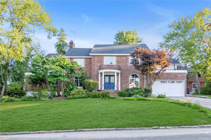 Welcome to this exquisitely gut renovated Center Hall Colonial home in the Harbor Hills District of Great Neck. Meticulously redesigned from top to bottom by a professional interior architect, this home boasts 3, 884 square interior space over a 10, 759 square foot lot. The home is designed with premium materials from well-renown brands, including new windows, a new Hyper Heat HVAC system, top-tier appliances, and in-ceiling speakers throughout. The first floor features a grand foyer with high ceilings, a gourmet eat-in kitchen equipped with Thermador appliances, a living room with custom cabinetry and a modern electric fireplace, a formal dining room with built-in cabinets, an entertainment room leading to a sunroom, a cozy guestroom/home office, and a powder room. Upstairs, the master suite features a luxurious full bathroom with high-end vanity, a walk-in closet, and access to a large terrace. This floor also includes three additional large bedrooms and two full bathrooms, with a second terrace connected to one of the bedrooms. The fully finished basement, accessible via a separate entrance, adds even more living space, complete with a full bathroom and laundry room.  Outside, the property features a wide driveway leading to a two-car garage equipped with a Tesla Supercharger, and a backyard with a portable outdoor heater. Situated in a Blue Ribbon Award school district, this home is very close to schools and a quick drive to Harbor Hills Park, which offers exclusive amenities such as pools, tennis courts, and playgrounds for residents. With its prime location near the LIRR, and various dining and recreational options, this home is perfect for those seeking luxury living in a vibrant community.