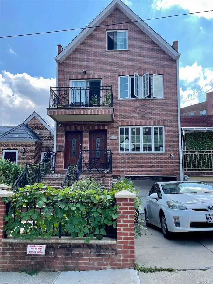 Building rebuilt in 2021. Beautiful, large two-family house. Front and back two big balconies. Skylight. One indoor garage and parking driveway. Separate utilities. New sprinkler fire system. Water pressure control system. Premium area in the heart of Forest Hills. Convenient to all.