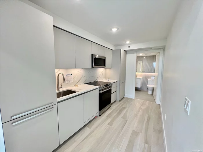 Brand new one-bed condo with W/D in unit, microwave, dishwasher, heated floor, Daikin ACs all installed, vented-out kitchen, floor-to-ceiling windows. Lots of nature lights. The gym and roof deck for BBQ are available for use. You will be the 1st one enjoying this beautiful 1Bed dream home.