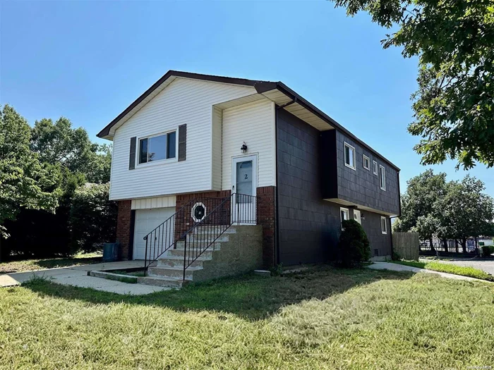 Finally Affordability Meets Comfort, Convenience & Practicality...Look No Further Than 2 Babcock Ave, Ronkonkoma! This Spacious Hi-Ranch Features An Open Layout In The Common Areas With Vaulted Ceilings, A Spacious Eat In Kitchen, & A Large Livingroom/Diningroom Combo...Walk Down The Hallway To Your Primary Suite With A Private Bath, Two Additional Bedrooms & A Full Bathroom For All To Use...Stroll Downstairs To Your Common Area Laundry Room With Ample Storage And Access From Both Levels. The Downstairs Features Two Separate Entrances That Lead Into A Large Family Room. Two Additional Bedrooms & A Full Bathroom Complete The Downstairs With A Wetbar for Entertaining Guests Out The Sliding Glass Doors To Your Private Fenced In-Yard. Notable Features Of This House Include: 2 Separate Thermostats, Central AC, 3 Exterior Entrances, 2 Private Driveways, 10 Year Old Roof, A Primary Suite With A Private Bathroom & Very Close Proximity To The LIE, LIRR & All Other Public Transportation Resources Ronkonkoma Station Has To Offer.