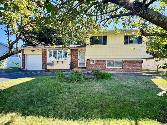 Welcome to 367 W. 22nd Street. This inviting 4-bedroom, 2 .5 bath expanded split level is perfectly set on a beautiful cul-de-sac. Featuring a formal living room, dining room, spacious kitchen and 15x27 large extended great room. Lower level with an outside entry, den, bath and bedroom. One car attached garage with new door and a double-wide asphalt driveway. Private yard-ideal for relaxing or entertaining. Close to all local amenities, shopping, highways and public transportation. Come and discover all the possibilities this wonderful home has to offer!