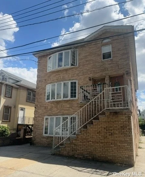 Spacious detached brick three family with 3 three brs apartments and full basement ,  private driveway convenient to all