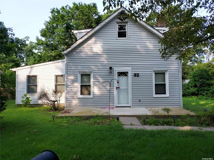 This cozy 2 Bedroom home has an extra large eat In Country Kitchen, Wood Floors and a great location close to the Beach.