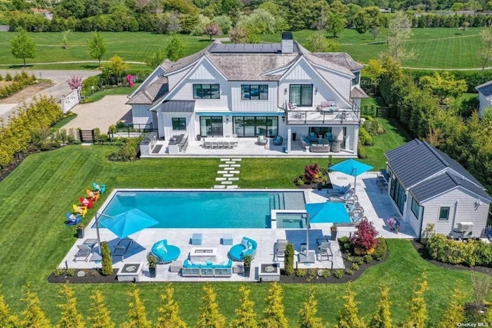 Presenting an extraordinary opportunity in Southampton-a stunning 8-bedroom, 9-bath custom transitional gem that epitomizes the essence of Hamptons sophistication and timeless charm. Behind its gated entrance, this thoughtfully constructed 3-story haven offers an unmatched combination of opulence and tranquil living. Be welcomed by magnificence with an impressive double-height foyer, highlighted by a bespoke lighting feature above floating stairs. Inside, the open layout is enhanced by lofty 10&rsquo; ceilings and anchored by a gas fireplace in the great room, setting an inviting tone for social gatherings. Delight in the custom eat-in kitchen, showcasing elegant Ciuffo cabinetry, a central island, and high-end Wolf and Sub-Zero appliances, complemented by a tasteful dining room with a custom wine display. Additionally, on the main level, the ensuite junior primary includes a walkout access to the terrace, a walk-in closet, and a double vanity bathroom. Upstairs, explore the luxurious primary suite, featuring a private entrance, exquisite bath, expansive walk-in closet, and a sweeping balcony-ideal for serene mornings or evening relaxation. Three additional bedroom suites on this level each present distinctive, custom designs, spacious baths, and walk-in closets, embodying unparalleled comfort and flair. The lower level extends the living area with three more bedroom suites, each radiating resort-like elegance and ensuring ample room for guests or flexible use. Outdoor living is reimagined here, with a private mahogany terrace off the primary suite, a covered deck with an outdoor fireplace and TV area, and three firepits, all crafted for superb outdoor entertaining. The estate also features a 50&rsquo; heated gunite pool with a bluestone patio, a lavish pool house with a bar, and an outdoor kitchen boasting an EVO grill, creating the perfect setting for memorable gatherings. Further elevating this remarkable home are a custom den/office space, radiant heating for maximum comfort, a cutting-edge Control4 system, a premium home theater with enhanced sound, and substantial landscaping upgrades, including an outdoor lighting package. Residents will enjoy access to The Fields community&rsquo;s tennis courts, sports court, and a 12-acre reserve with a picturesque trail. Located just moments from the lively heart of Southampton Village and a short drive from pristine ocean beaches, this property is perfectly positioned for those seeking a retreat in the Hamptons&rsquo; most sought-after locales. With over $2M in enhancements and amenities that rival the luxury of Palm Beach&rsquo;s finest, this home is a testament to superior craftsmanship and exquisite living. Experience the pinnacle of Hamptons lifestyle in this remarkable Southampton sanctuary, where every detail embodies the epitome of custom luxury and sophistication.