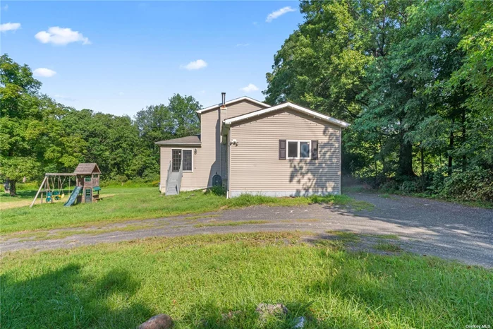 Looking for house to make your own, look no further! This adorable 2 bed 2 bath home situated on 6.4acres is just waiting for you to come and put your touches on it. Freshly Painted with new septic fields. If you like to live in the great out doors this will be the perfect place to call home.