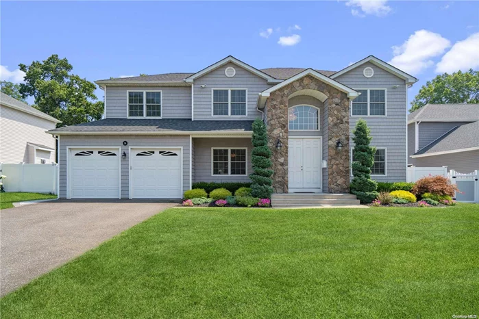 Discover the perfect blend of comfort and style in this stunning Transitional Like New Center Hall Colonial located on a peaceful cul-de-sac. offers spacious interiors and modern amenities, Step inside to a grand two story entry followed by a spacious kitchen that features abundant cabinetry w/ granite counters and high-end appliances, making it a chef&rsquo;s dream come true! Adjacent, the dining room with wet-bar provides a charming space to gather for meals with family and friends. Relax and unwind in the comfortable family room, flooded with natural light and accented by stylish wood floors and gas fireplace with plenty of room to spread out and entertain. Formal Living room adjoins the foyer and family room for great flow. Second floor offers a spacious primary suite with full bath and WIC & four generously sized bedrooms, full bathroom featuring modern fixtures & ceramic tile. Basement is unfinished with outside entry and 9&rsquo; ceilings. The backyard offers the perfect setting for outdoor gatherings, With paver patio flat grassed area with plenty of room for a pool! So whether you&rsquo;re hosting summer BBQ&rsquo;s or simply relaxing in the sunshine or playing with the family it truly suites all. Located in the vibrant community of Commack, residents enjoy easy access to a variety of shopping, and dining, . Don&rsquo;t miss your opportunity to make this exceptional residence your own. Schedule a showing., Additional information: Separate Hotwater Heater:y