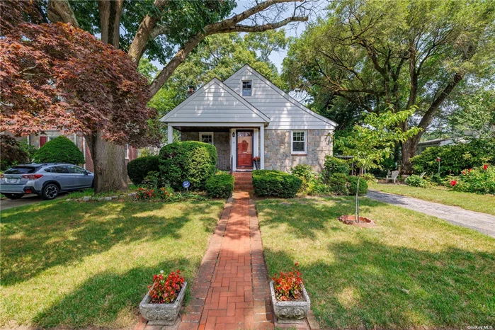 Welcome to this charming Freeport Enchanted Cottage. This gem is located in the heart of Northern Freeport, not in a flood zone, set on a beautiful treelined Cul de Sac. This Storybook Cottage is complete with a living room featuring hardwood floors and a wood burning fireplace. Eat in kitchen with cream colored cabinets and granite counter tops (not representing dishwasher) First floor includes primary bedroom plus an additional bedroom. Charming finished attic complete with 2 rooms- you decide. Home sits on 75x100 lot, has a 1 car garage and screen porch. Full basement is unfinished. Home needs some updating and is sold as-is.