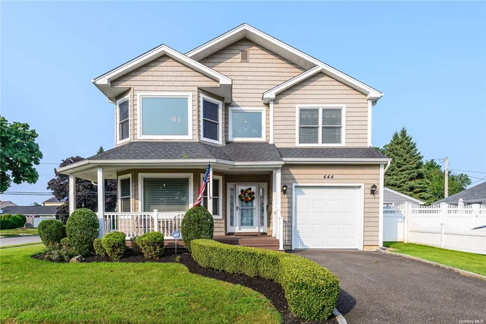 Beautiful, move-in ready classic colonial in East Meadow, tucked away on a neighborhood street, yet close to all central Nassau has to offer. Soaring 2-story foyer leads to formal living room, with bay window that floods the room with light. The formal dining room is spacious. The heart of the home is the huge chef&rsquo;s kitchen and den with fireplace and sliders out to the large back deck and property. There is a full finished basement with half bath and loads of storage closets. The primary suite is entered through double doors and features two walk-in closets, full bath with tub and separate shower and double vanity. There are three additional bedrooms, a full bath and a laundry room. Additional features include: crown moldings, wainscoting, gleaming hardwood floors, central air conditioning, fireplace, tile flooring, wall to wall carpeting, solid wood doors, tile baths. There is a fully fenced rear yard with nice landscaping, large rear deck and front covered porch and inground sprinklers. Centrally located and close to everything!