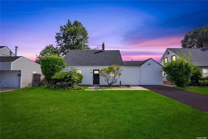 Step into this Gorgeous Cape House located in Westbury. The spacious and modern Living Room showcases its own set of charming features including Porcelain Floors throughout with new LED High Hats, and New siding windows allowing natural light. A family room provides the perfect blend of comfort and functionality, making it the heart of your home. While maintaining an open space for the Formal Dining Room with updated Stainless steel appliances, ample cabinet space, and a layout designed for efficient meal preparation. This house boasts 4 generously sized bedrooms, each featuring an abundance of natural light, hardwood floors all over and 2 Full Bathrooms that feature modern fixtures and serve the needs of both residents and guests. An inviting patio space perfect for outdoor dining, barbecues, or simply soaking up the sun with a beautifully landscaped backyard. A private driveway for parking. Located near top-rated schools, parks, shopping, and dining options, providing easy access to all amenities. Make this your future home!