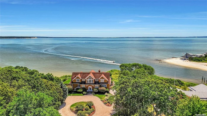 Just Listed! Relax Poolside And Enjoy The Spectacular Views Overlooking Peconic Bay & Robins Island From This Beautifully Renovated Home With Dining, Shopping and Local Wineries All Within Reach.