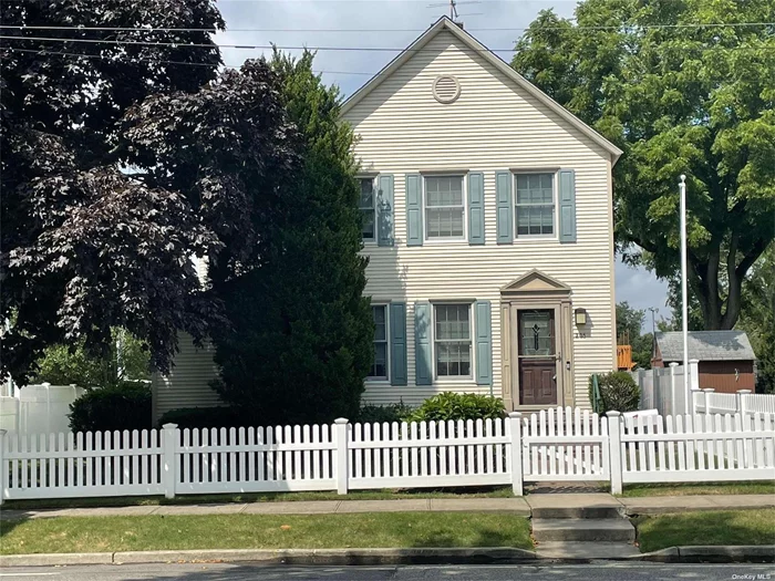 Oldie but Goodie!! Very well maintained home featuring many updates including windows, kitchen, appliances, flooring, upstairs bathroom while still maintaining the charm of yesteryear! 2nd floor features 2 large bedrooms including a walk-up attic providing additional storage. 1st floor is graced with a living room w/gas fireplace, bedroom/office, dining room, kitchen, family room, full bath and laundry room. Plenty of closet space. Backyard patio and outside entrance to unfinished basement. No representation on 2nd floor A/C. AS IS