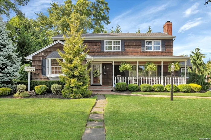 Welcome to this Pristine Old Harbour Green mint center hall Colonial, located on an over-sized property 105x129. Sip a cold or hot mug of your choice on your charming covered front porch. Spacious rooms adorn this open floor plan with all formal-size rooms and closets galore! The generous living areas include a large formal living room with a wood burning fireplace and custom wood mantle which sits adjacent to a Banquet Dining-room. Lounge daily in a comfy Family-Room with a cathedral ceiling, generous lighting from 2 sky-lights and a custom built-In wall-unit. Enter into a modern farmhouse style updated kitchen with custom cabinetry, large pantry storage, granite counters, stainless steel appliances and a separate seating area with French doors to the backyard, Impressive counter space awaits you for your culinary creations. This home provides attention to every detail: Custom ceiling and floor moldings, new hardwood floors on the first floor, hi-hats throughout, (excluding 3 Br&rsquo;s) and custom window treatment that stays. The second floor features: 4 generous size bedrooms, an updated family bath and spacious Primary Bedroom that includes an En-suite. (Plumbing in the wall for a shower install) Minutes to Birch Lane Elementary School and Green Harbour Beach Club available for your enjoyment! Minutes to Local Dining, Public Parks, Marina, Shopping and Transportation. LIRR operates from Massapequa to Penn Station every 20 minutes with a short journey of 56 minutes. Don&rsquo;t miss this great opportunity to make 87 Cabot Road, Old Harbour Green your home!