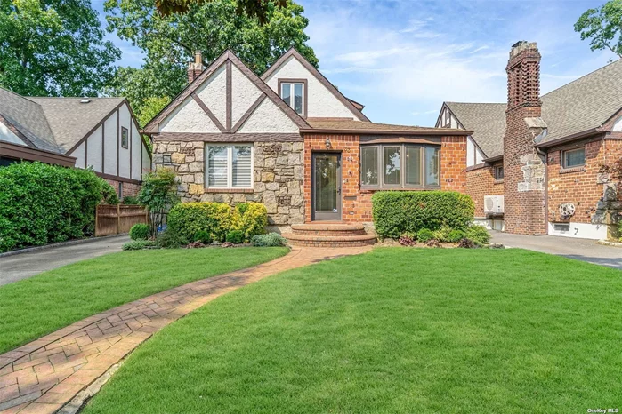 Welcome to your 3-bed, 3-bath Tudor-style home, located in the heart of Rockville Centre Village. The home&rsquo;s charm begins with its stone accents and the interlocking brick path leading to the front entrance. Inside, a bright living room with a cozy fireplace and sun-kissed wood flooring creates a warm, inviting space that feels like home from the moment you walk in. The formal dining room is ready for memorable gatherings, and the spacious bedrooms offer a peaceful retreat. The fully finished basement provides a versatile space, whether you envision a cozy rec room, a creative studio, or a home office. Outside, the covered back porch and concrete patio invite you to unwind and enjoy the serenity of your fenced yard. With low-maintenance landscaping and a one-car garage with private parking, convenience meets comfort in this home. Imagine your life unfolding here-filled with laughter, warmth, and countless cherished memories. This is more than a house; it&rsquo;s where your story unfolds.