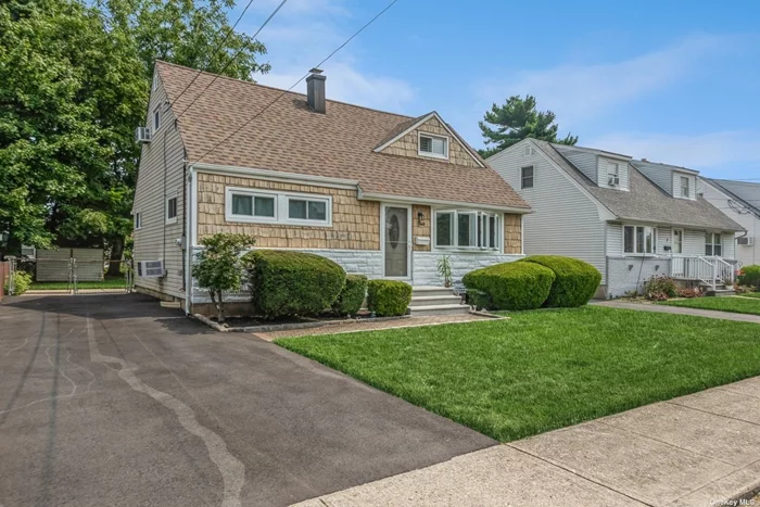 This charming Cape Cod-style home offers a perfect blend of classic design and modern updates. Featuring four spacious bedrooms and two full baths. The updated kitchen is seamlessly connected to the open layout on the first floor, ideal for entertaining. The home is equipped with a reliable gas heating system, and recent updates include new windows, a roof, and an upgraded electrical system, ensuring peace of mind and energy efficiency. The house has a full basement , storage will never be an issue, with plenty of room to keep everything organized and tidy. The professionally manicured yard adds curb appeal and offers a serene outdoor space for relaxation and enjoyment. Located close to shops, transportation and parks.