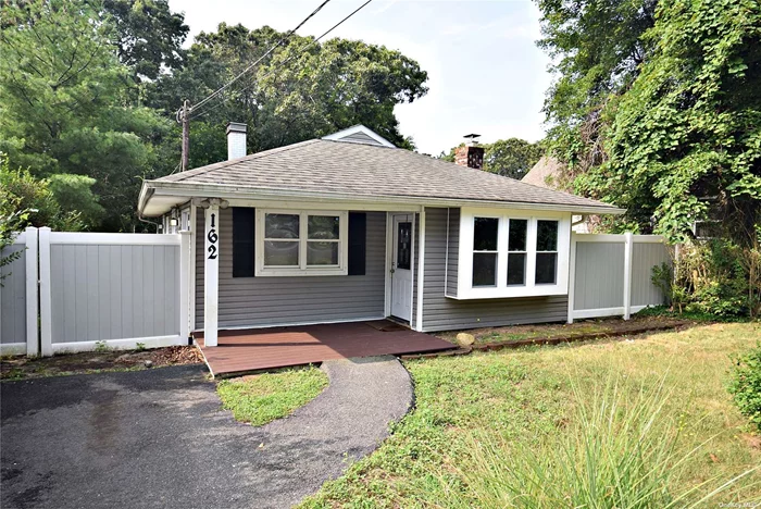 This delightful 3-bedroom, full bath Ranch offers a perfect blend of comfort and convenience. The home features a 4-year-old roof, ensuring peace of mind for years to come. Inside, you&rsquo;ll find beautiful flooring throughout, leading to a beautifully renovated kitchen with white shaker cabinets, a breakfast island, and stainless steel appliances. The spacious Great Room boasts a lovely fireplace, perfect for cozy winter nights. Step out from the kitchen onto a spacious deck, ideal for entertaining and al fresco dining. The primary bedroom also has its own set of patio doors opening onto the deck, perfect for morning coffee or evening relaxation. The fully fenced yard provides both privacy and security. The home is equipped with an oil hot air heating system and central air conditioning, both installed in 2020, offering year-round comfort. Conveniently located close to schools, shopping, local delis, restaurants, and the best bagel and pizza spots in the neighborhood, this property has everything you need. Fire Island&rsquo;s Smith Point Beach is less than a 10-minute drive away, and you&rsquo;ll enjoy easy access to the train station and all major highways. Don&rsquo;t miss this fantastic opportunity! No showings until first open house.