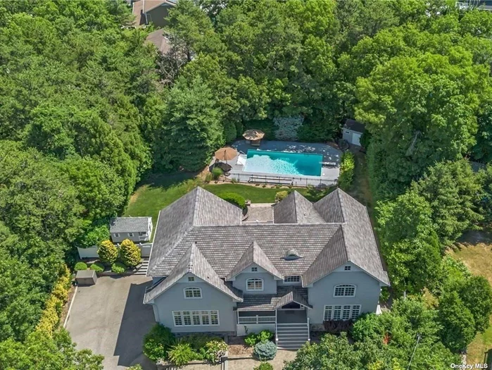 **Elegant Masterpiece in the Heart of Smithtown Pines** Welcome to this exquisite, custom-designed and built luxury residence, situated on a picturesque .75-acre property in the coveted Smithtown Pines community. This magnificent home, crafted by the current owner in 2005, boasts approximately 4, 500 square feet of opulent living space, showcasing the finest quality construction and craftsmanship. As you step inside, you&rsquo;ll be greeted by the warmth and sophistication of this stunning home, featuring four spacious bedrooms and four full bathrooms. The piece de resistance is the expansive primary suite, boasting two walk-in closets, and an awe-inspiring primary bathroom with travertine flooring and radiant heat, a gas fireplace and access to a balcony overlooking the tranquil backyard. The thoughtful design and attention to detail throughout the home are evident in every room. From the beautifully appointed kitchen to the elegant living areas, every space is meticulously crafted to provide a sense of comfort and luxury. But it&rsquo;s not just the interior spaces that make this home truly special. The full-finished basement offers additional living space, perfect for working, entertaining or relaxing, and is conveniently accessed through a mudroom that connects to the three-car attached garage. The property itself is a tranquil oasis, with lush greenery and mature trees surrounding the beautifully manicured lawn. The perfect setting for outdoor gatherings near your inground pool and firepit. This exceptional custom built home in Smithtown Pines offers the perfect blend of elegance, functionality, and tranquility. Don&rsquo;t miss this rare opportunity to own a truly unique and luxurious home in one of Long Island&rsquo;s most sought-after communities. Come see for yourself and fall in love...