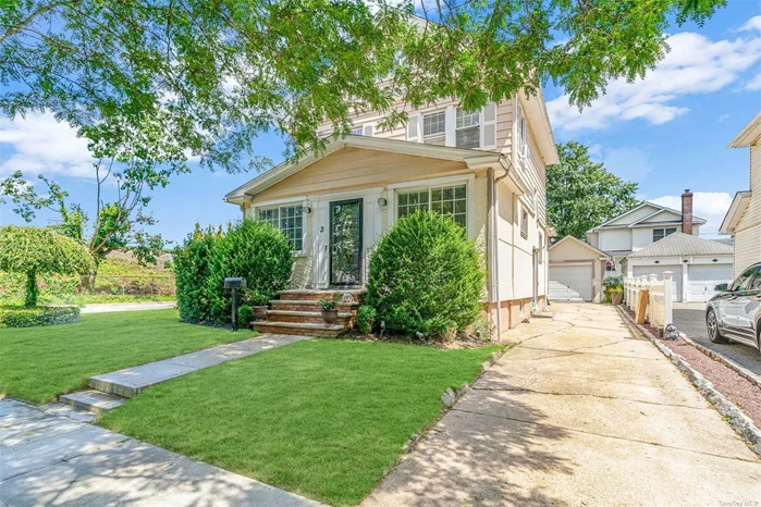 Welcome to your personal one of a kind spa sanctuary! This stunning recently renovated colonial was designed with tranquility and luxury in mind! It offers a retreat-like experience with amenities such as a built-in steam shower, 5 seater jacuzzi with a retractable cover and sauna room to sweat off the day! Every section of this gorgeous 3 bedroom 1.5 bath home was designed to give the very best in luxury and comfort. Have guest over for dinner? Step into your newly renovated kitchen featuring luxurious Cafe kitchen appliances surrounded by gorgeous light cream cabinets and a quartz countertop to blend it all together. Did we mention, hardwood floors throughout, remote controlled gas powered fireplace, motorized blinds in the dinning room, split units for cooling, and an automated sprinkler system that can be controlled through your phone! The love for detail can be found in every corner giving you a move in ready experience and atmosphere. Lets also include a recently renovated electric panel, boiler and hot water tank, a finished walk up attic for all your storage needs, a finished basement with an outside entrance, garage and 3+ car driveway for all your vehicle needs! This gem is also close to restaurants, shops and public transportation, the Long Island Railroad, and all major highways. Come on by and allow this home to wow you with its warming presence.