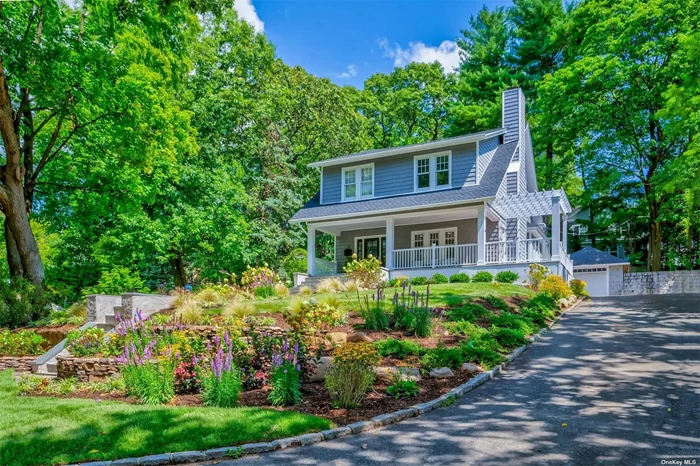 Perched on a picturesque and beautifully landscaped quiet hilltop, this move-in-ready Baxter Estates Colonial home with charming front porch, is the epitome of perfection. Boasting 4 spacious bedrooms and 3.5 luxurious baths, every inch of this residence has been meticulously renovated with no detail overlooked. Step inside to find an expansive living room, with its gleaming hardwood floors and wood-burning fireplace. Adjacent to the living room is the formal elegant dining area. The stunning chef&rsquo;s eat-in-kitchen features stainless steel appliances, custom cabinetry, quartz island and countertops, all opening to a cozy breakfast area and den. The primary suite is a serene retreat, complete with spacious closets, wood burning fireplace and a spa-like en-suite bath. Three additional well-sized bedrooms offer fitted closets and share a beautifully updated bathroom with dual vanity. Additional highlights include a walk-up finished attic, and a finished lower level with a versatile recreational room, office/bedroom, full bath, and plenty of storage. The yard offers privacy and tranquility, with a patio area perfect for outdoor dining and relaxation. CAC, in-ground sprinklers, detached 1 car garage. This turn-key home is conveniently located with easy access to Port Washington&rsquo;s vibrant downtown. You won&rsquo;t want to miss this one!