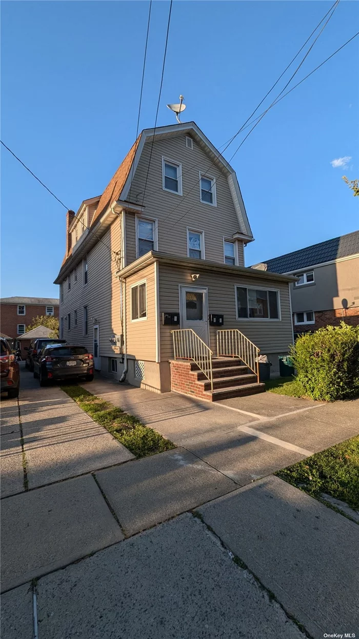 This charming Dutch Colonial is a legal 3 family home, located only one block from Kissena park and nearby public transportation to take you to downtown Flushing. Only minutes from the LIRR. The building was completely renovated back in 2010 with siding, roofing, 3 gas boilers and 3 hot water heaters. Private driveway leads to a brick garage built around 2005. Low property taxes keeps monthly expenses down as each unit pays for their own heating costs. Excellent for self use and or investment.