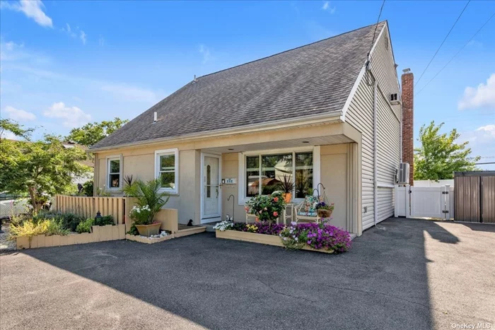 Introducing this lovely Cape, a 60x100 lot on this quiet street located in the Village of Island Park. This house has 4 bedrooms and 2.5 bath. Electrical Panel 200amps. The high vaulted 25&rsquo; ceiling in the living room allows for natural light and warmth. The 1st floor includes a formal dining room, eat in kitchen with sliding doors to the backyard, master bedroom with en suite bathroom, private entrance, splendid sun room with French doors and sliders to the yard. There is ample closet space and a half bath. The second floor has 3 bedrooms, 1 full bath and an extra bonus room with pull down stairs to the full sized attic. The fenced in backyard is equipped with a shed for storage and wraps around to the front of the house that features a large driveway and tranquil porch. Close to the LIRR and Long Beach Boardwalk. Welcome to the neighborhood!