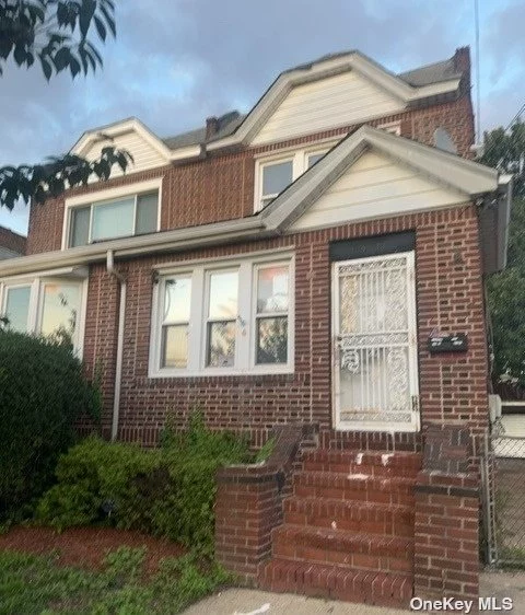 Semi attached . brick with private driveway and garage. full basement