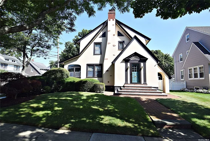 Beautiful Tudor-Style Home Located in Lynbrook Village, Features 3BR&rsquo;s, 1.5 bths, Entrance Foyer with closet, Spacious Living Rm with fireplace, Formal Dining Room, Kitchen, Laundry Area, Den, Enclosed Side Porch, Hardwood floors throughout, Wood Moldings and doors, Full basement, Walk up attic, plenty of closet space and storage, 2 Car garage. Move Right In to this Pristine home. Close proximity to LIRR, Bus, Schools & Shops.