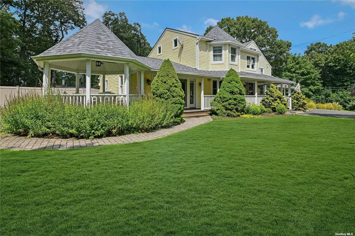 Charming Colonial farmhouse situated on 0.87 acres in the heart of Centerport. This elegantly appointed 4-bedroom, 3-bathroom residence features a gourmet kitchen equipped with new Viking double ovens, a DCS warming tray, and a Bosch dishwasher. The kitchen seamlessly transitions into a spacious entertaining area highlighted by a stone gas fireplace. French styled doors opened to a beautiful deck that wraps around the home, perfect for outdoor gatherings. This Centerport gem boasts cathedral ceilings, hardwood floors, granite countertops, spacious walk-in closets, second floor laundry and an alarm system. Ideally situated near Greenlawn and Huntington Village, the property offers proximity to schools, parks, beaches, golf courses, LIRR, restaurants, library and shopping. SD# 6 Harborfields School is ranked in the top 2024 Niche best schools.