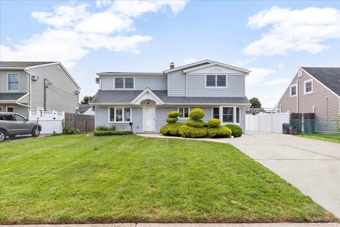 Welcome To 28 Harvest Lane! Move In Ready Levittown Colonial Ready For You To Just Unpack! Beautiful Curb Appeal Entire House was Completely Renovated 10 Years Ago from top to Bottom! Elegant Iron Rail and Wood Staircase  Multi Car Driveway Leading To One and a Half Car Detached Garage & Rear Patio.This Bright & Light Colonial Welcomes You With Large Living Room With Wood Look Porcelain Tiles & Over Head Lighting. Dining Area, Eat In Kitchen With White Cabinets, Granite Countertops, Breakfast Bar & Side Door Exit. Full Bathroom & Laundry/Storage Room Completes The First Floor. The Second Floor Features Hardwood Floors, 3 Large Bedrooms, Jack & Jill Bathroom With Double Vanity & Walk In Shower, Over Head Lighting, 3 Heating Zones, Separate Hot Water Heater,  4 Ductless Carrier AC&rsquo;s (3 yrs Old) & More!