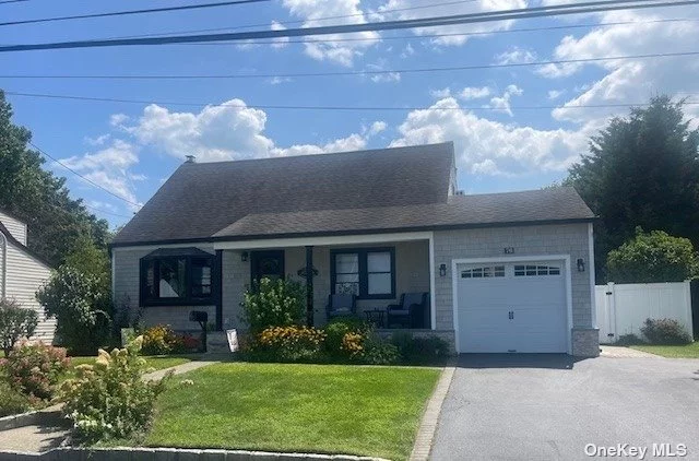 Beautifully Done 4 Bedroom Cape with Many Updates Including Eik with Quartz Counters and Updated Appliances, 2 Updated Full Baths, New Siding and Stacked Stone on the Exterior, New Deck in Backyard with Belgian Block Patio, and Vinyl Fencing.