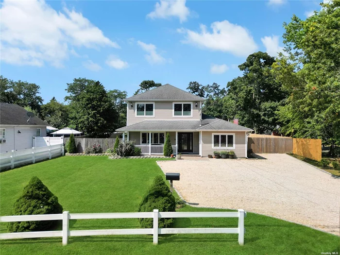 Charming Colonial in Patchogue-Medford School District Discover this beautifully 4-bedroom, 4-bathroom Colonial located in the heart of Patchogue. . Nestled on a .45-acre lot, this home boasts over 2, 900 square feet of living space, offering an ideal blend of modern amenities and classic charm. The first floor features a bedroom, a bright den/family room with cathedral ceilings, and a kitchen adorned with granite countertops and Energy Star appliances. This property offers an incredible opportunity for a separate apartment, perfect for rental income, guest accommodation, or a private home office. The fenced backyard, complete with a private driveway, & with it&rsquo;s front porch it provides the perfect outdoor retreat. Enjoy close proximity to shopping, dining, and transportation, making this property a true gem. This home won&rsquo;t last long!