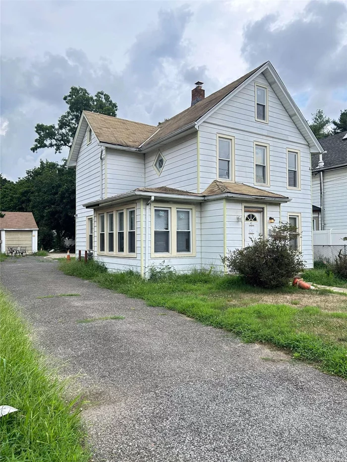 Beautiful Colonial Style. HOUSE Needs Renovations. The house has a lot of character and potential with an expansive yard. This property offers a great opportunity for outdoor living gardening and activities. If you are interested in taking on a project and creating your dream home, this may be the perfect opportunity for you.